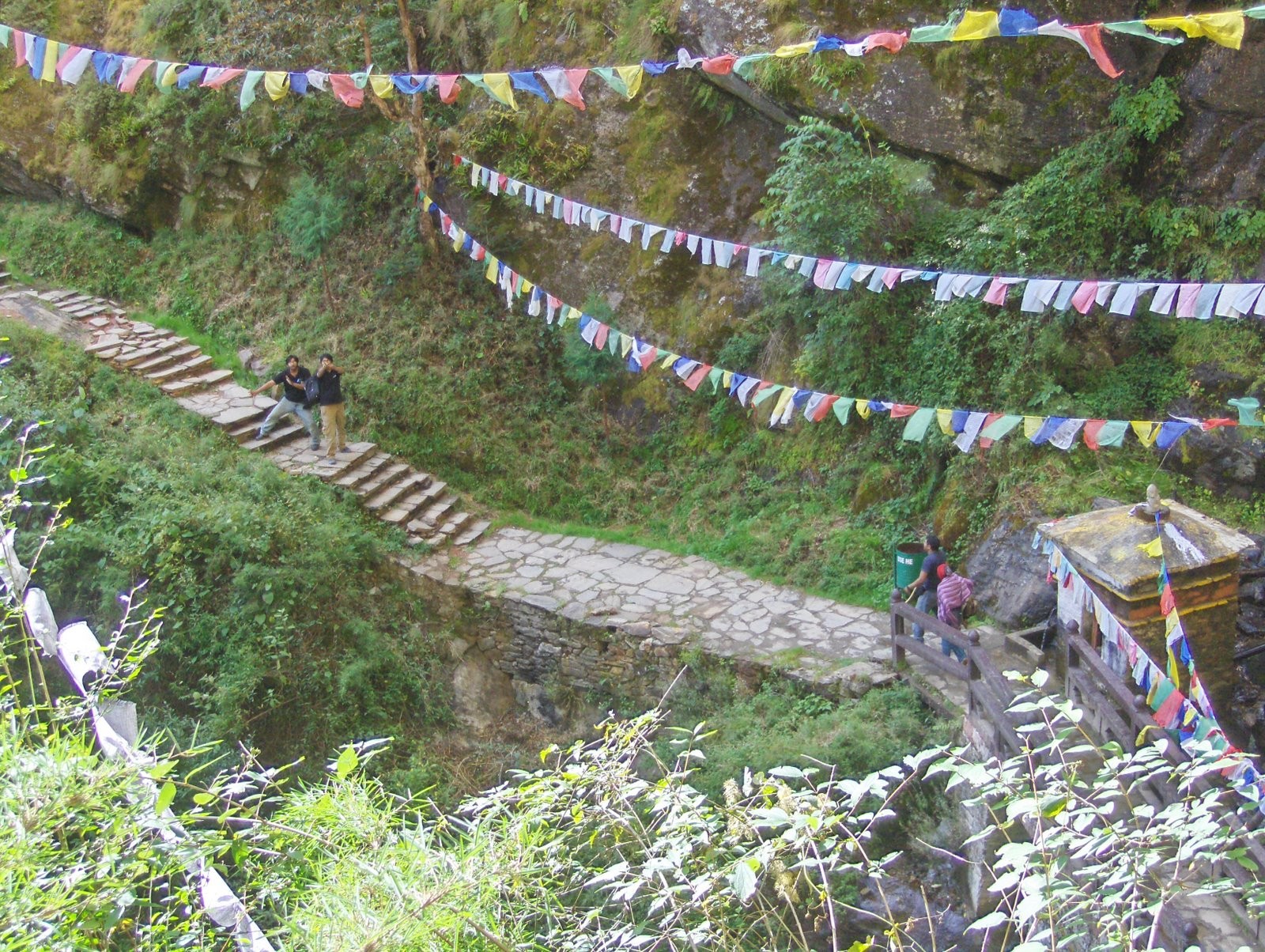 Prayer flags on a mountain road in Bhutan